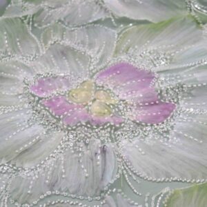 A painting of a purple flower adorned with pearls, set against a background of delicate polyester lace fabric