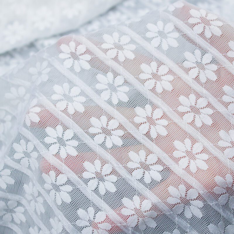 Floral-patterned white lace fabric composed of nylon and spandex materials