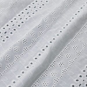 White cotton lace fabric featuring small holes and dots, creating a delicate and intricate pattern