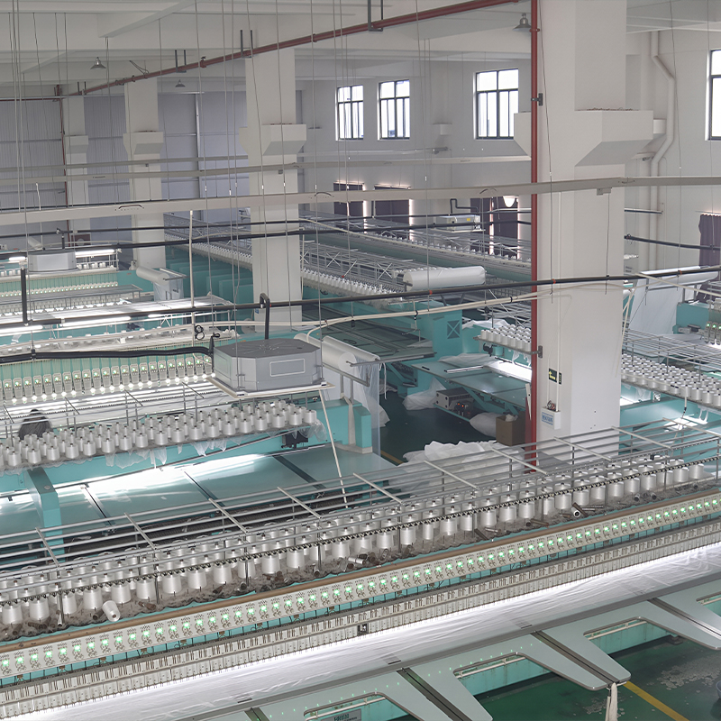 A view of the Yituo embroidery factory filled with numerous machines and equipment for textile production