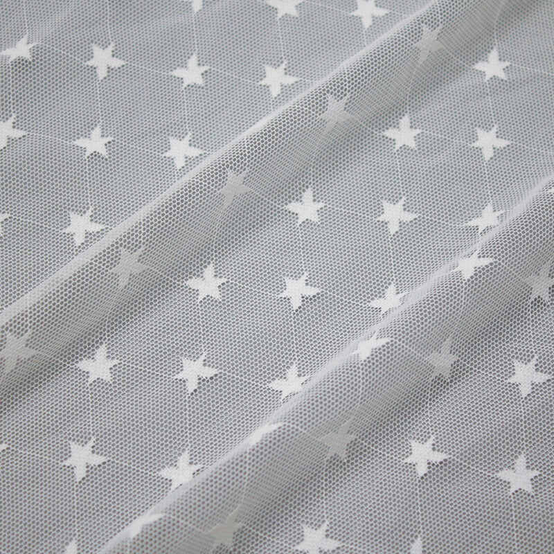 Gray background featuring a white star pattern on nylon and spandex lace