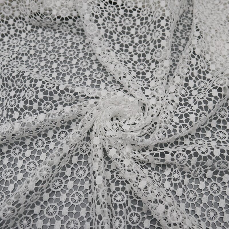 White polyester lace fabric featuring a large white flower design