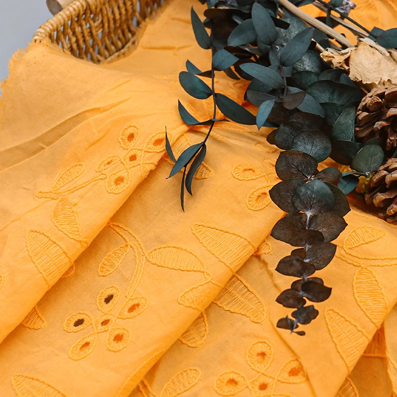 Manufacturer Wholesale Orange Customsized Color Jacquard White Fabric Eyelet Embroidered Fabric for Dress